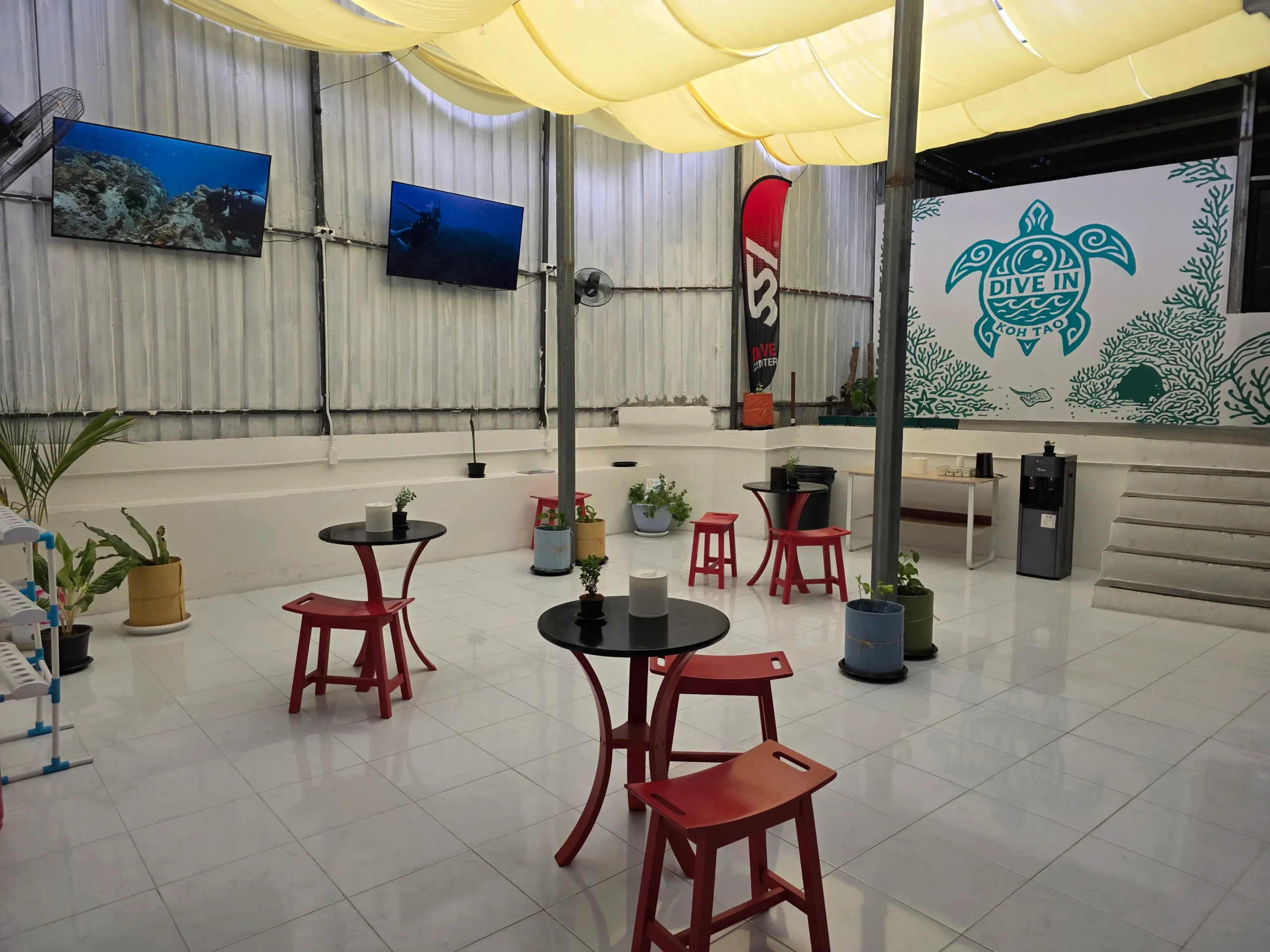 Indoor lounge and common area at Dive In Koh Tao dive center and hostel in Koh Tao, Thailand